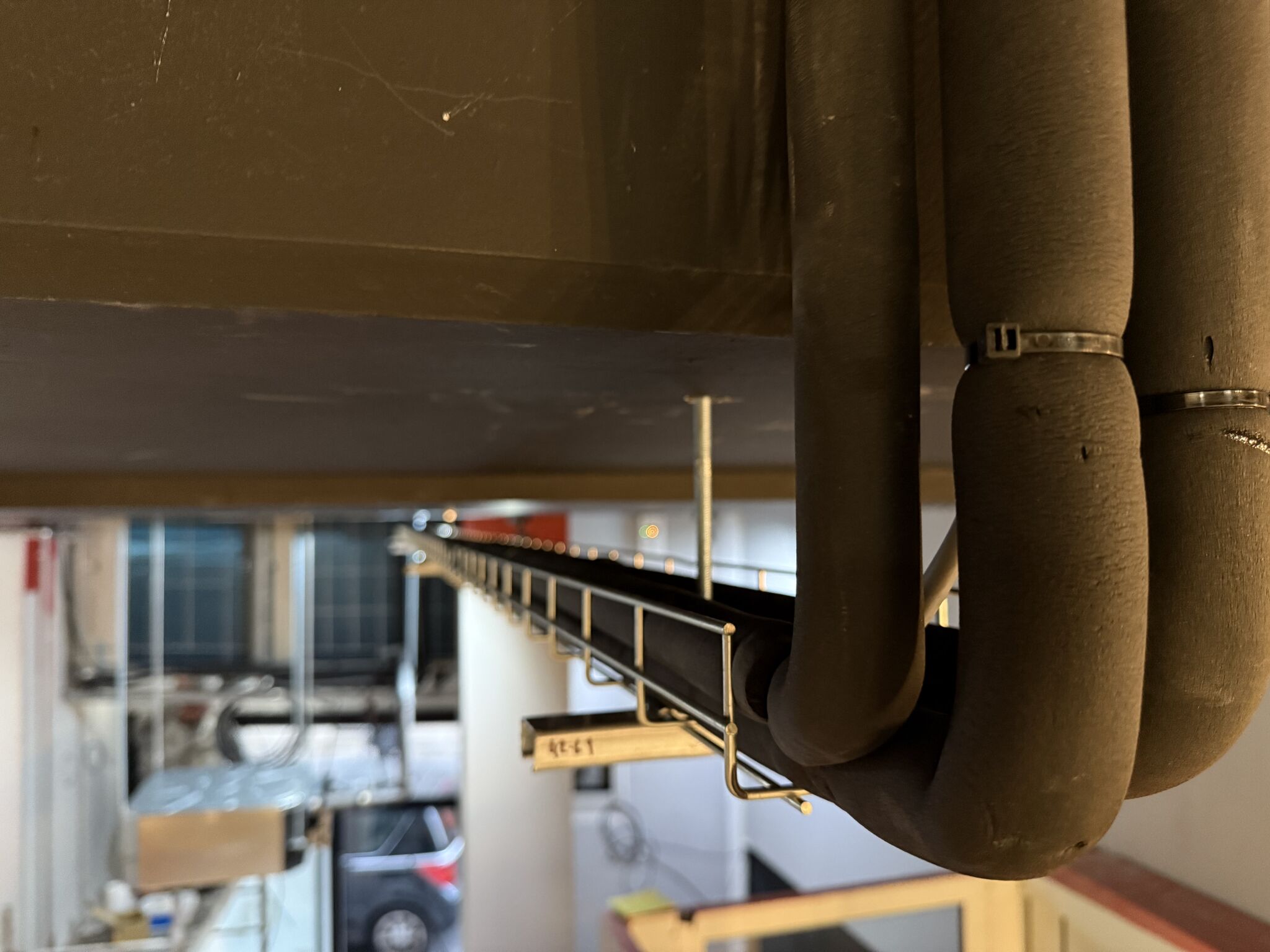 Pose et installation d'un système de climatiseurs et ventilateurs dans une salle de sport à Paris